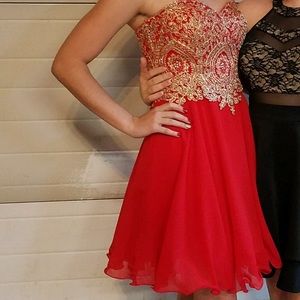 Vibrant red and gold lace plus beaded mini dress